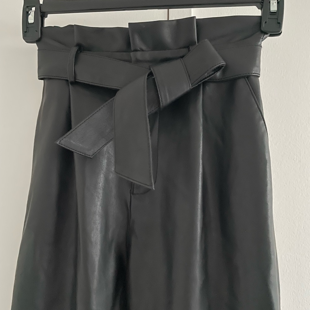 BB Dakota black faux leather pants with belt, size 2